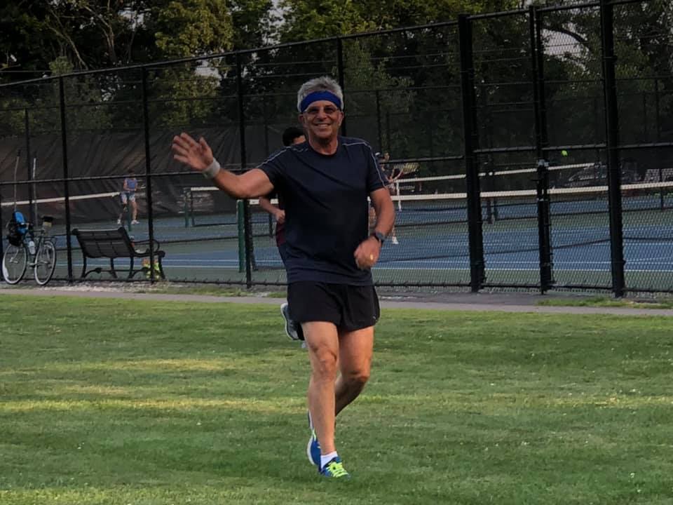 Team stretching in parking lot