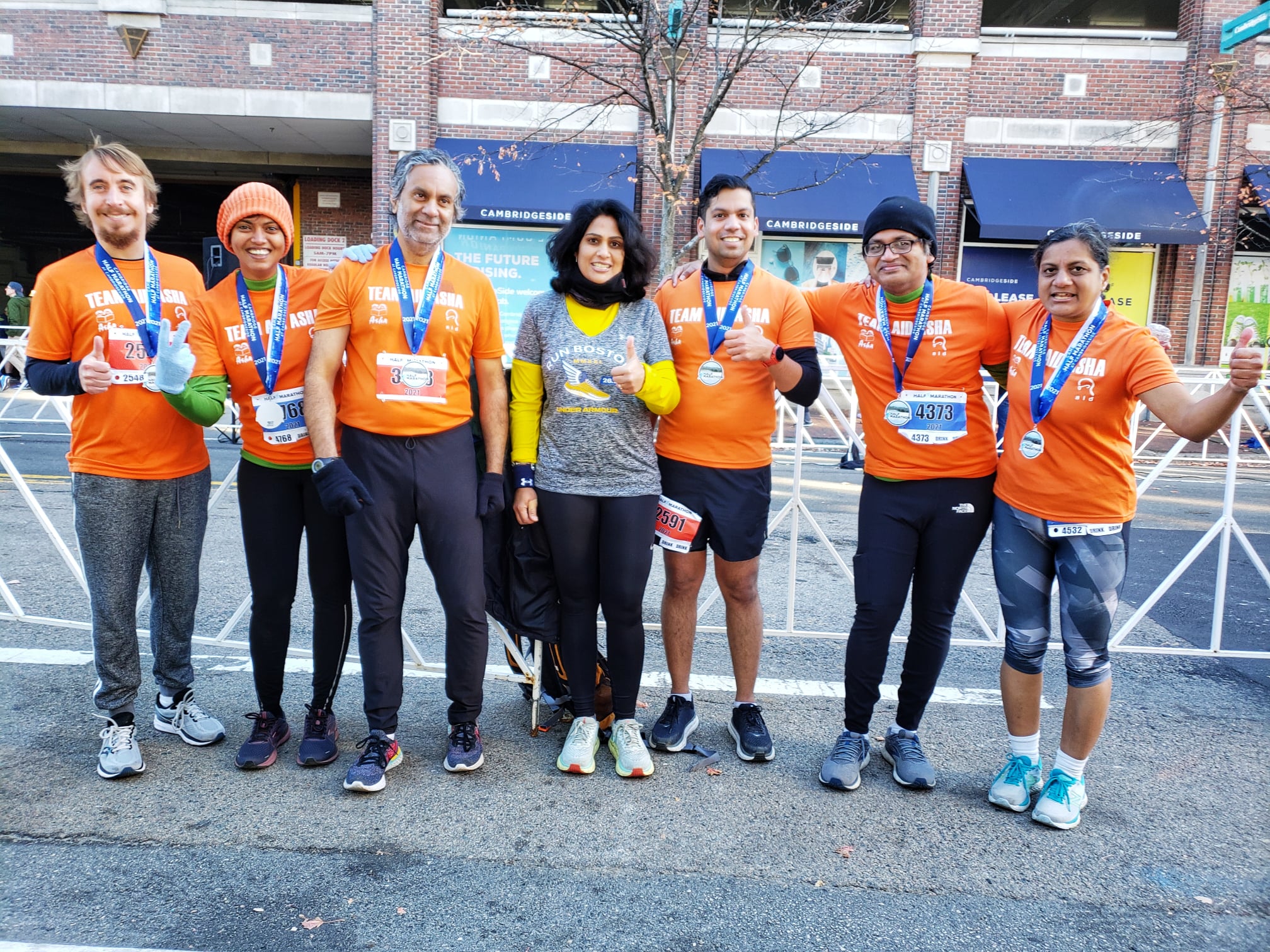 Family with runner after race